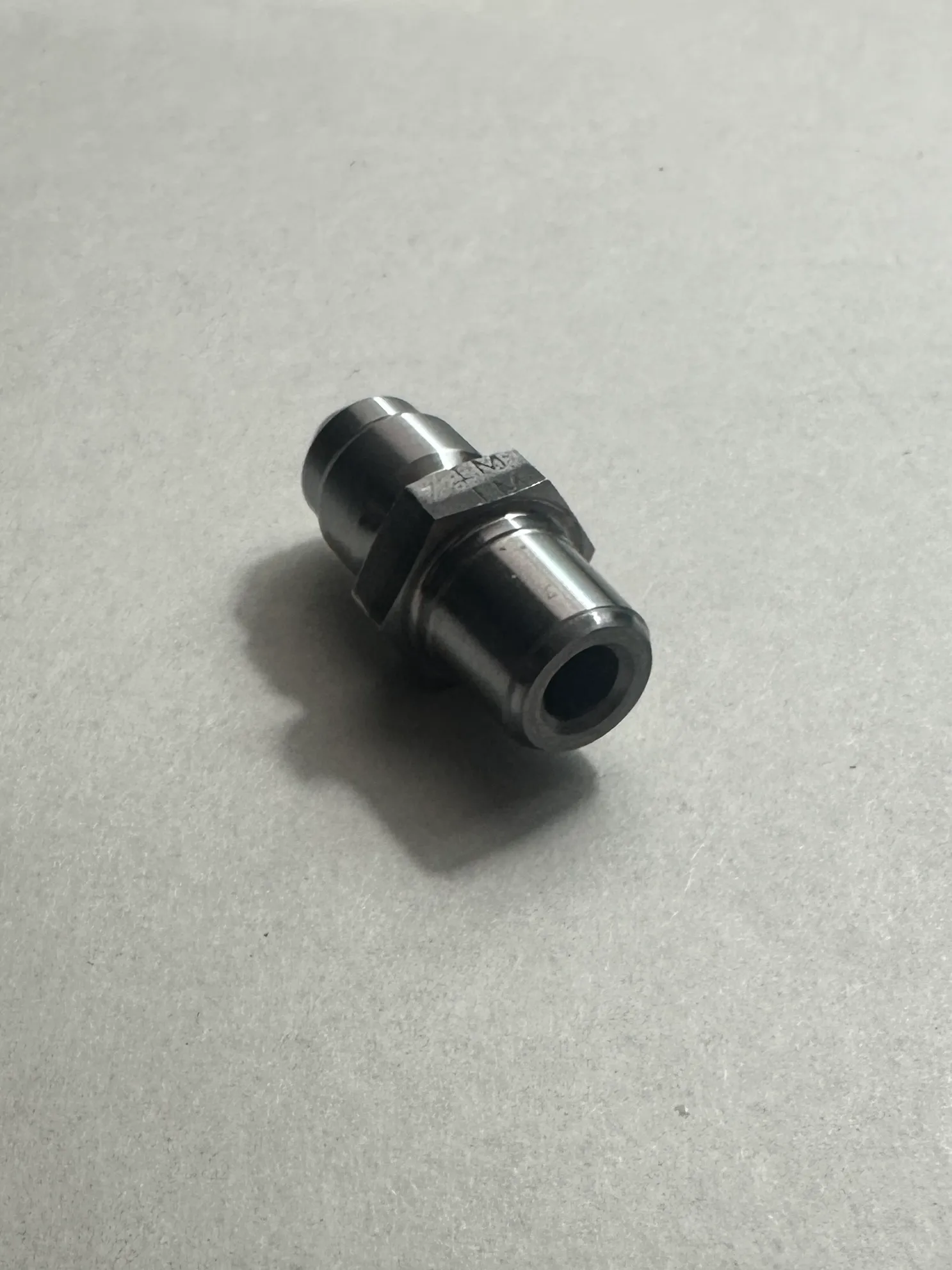 Hydraulic fluid control fitting — Kohler and Clark