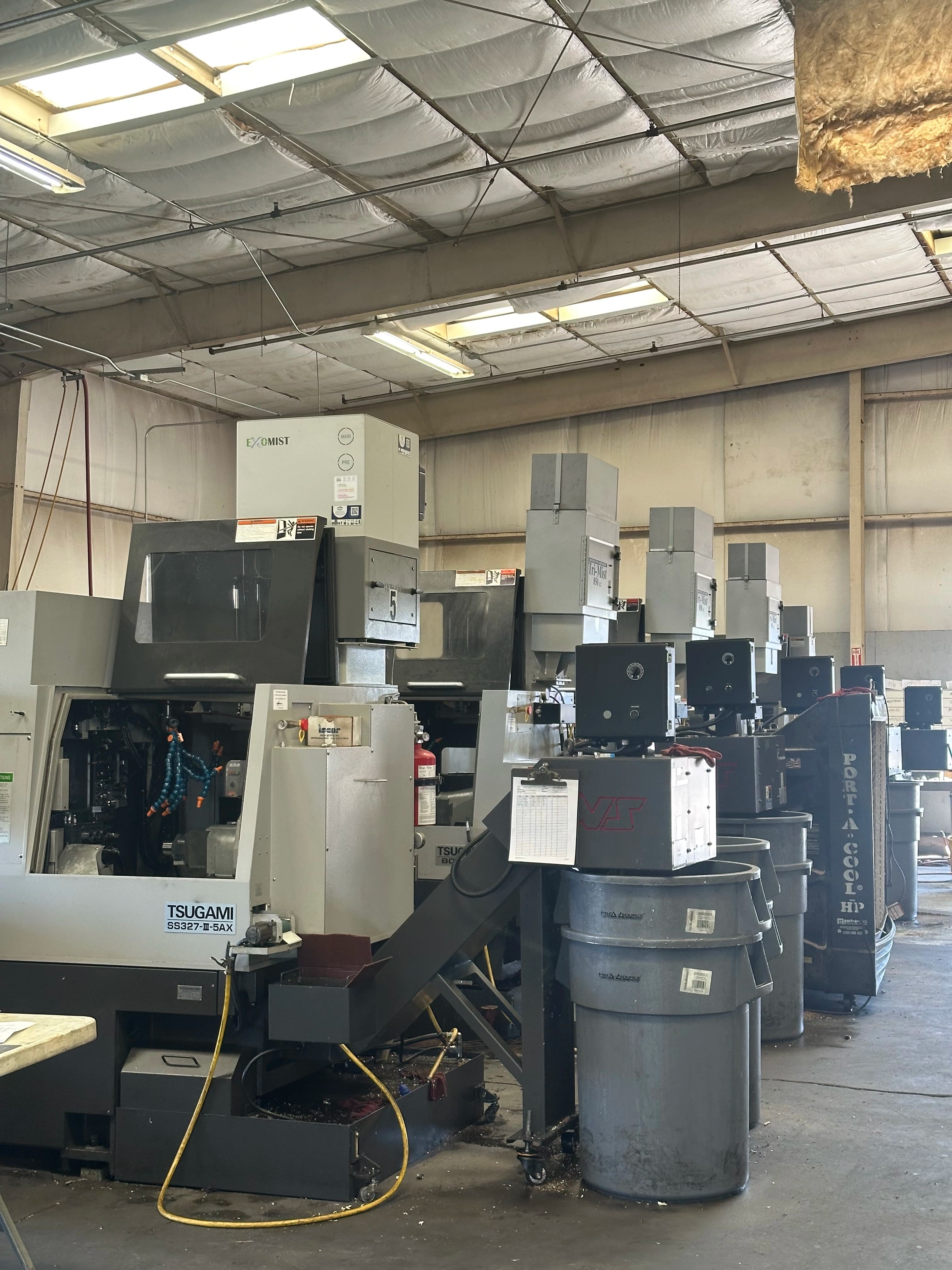 Tsugami SS327-III-5AX Swiss-type CNC turning machines on the shop floor at Kohler and Clark